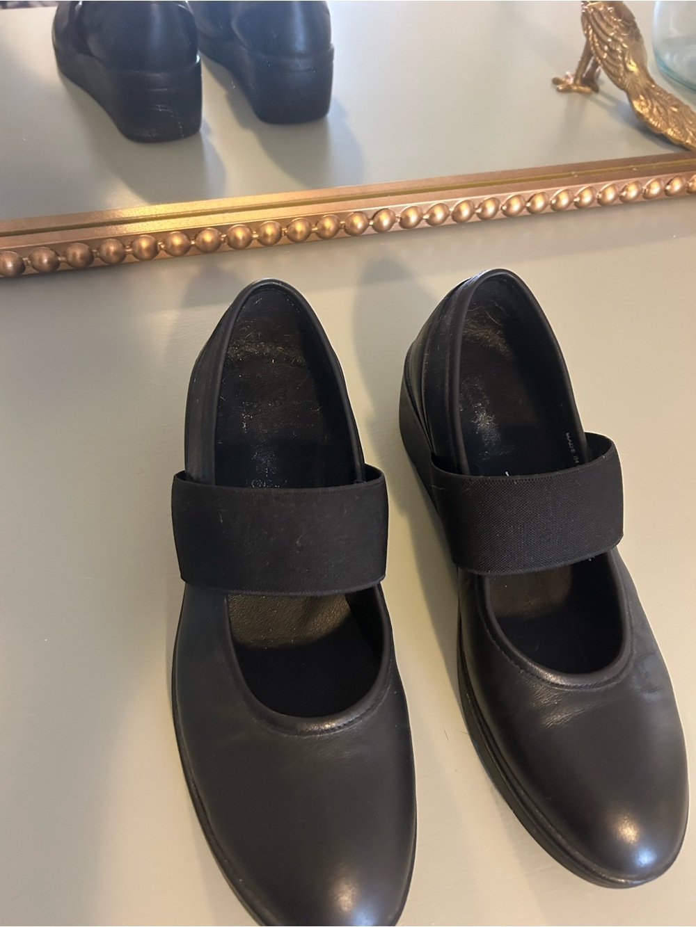 Fly London Women’s Black Mary Janes with Elastic Strap. Black, 2” heel.